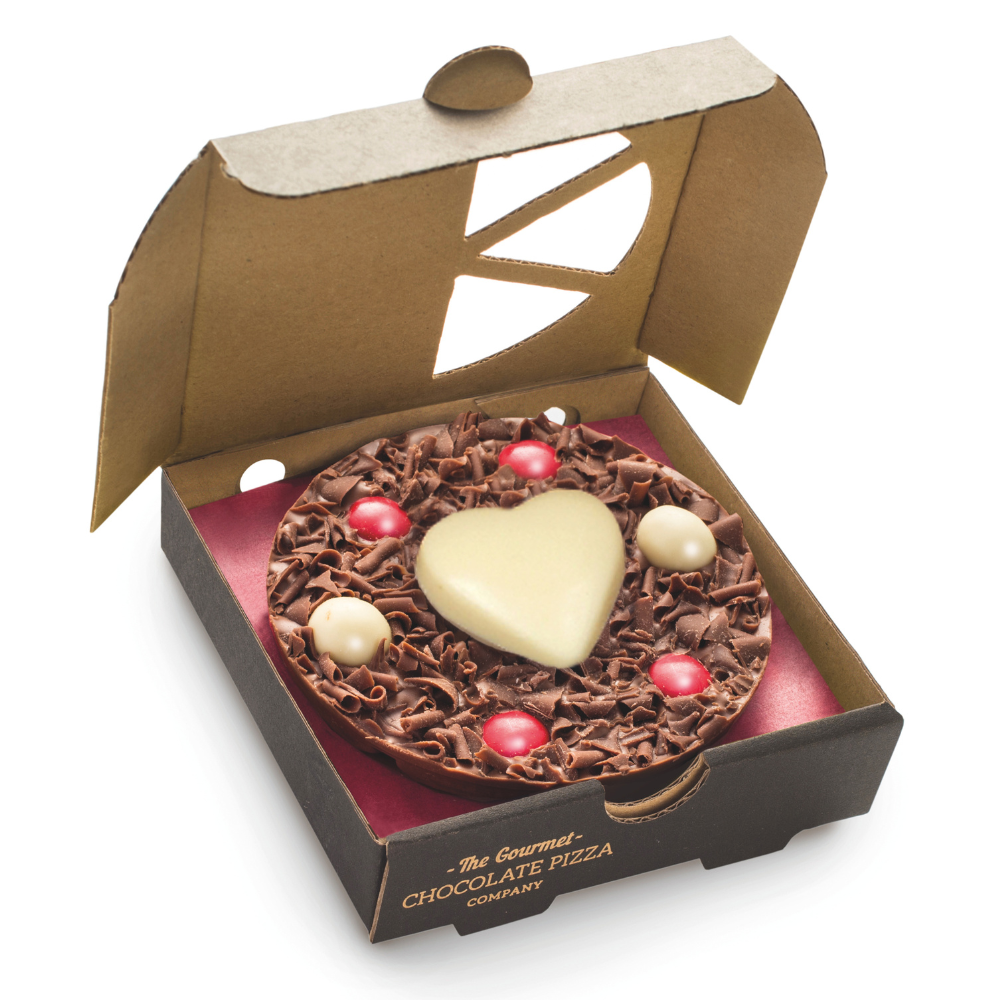4 inch mini chocolate pizza with red chocolate drops, white chocolate balls, milk chocolate curls and a white chocolate heart
